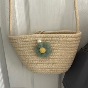 Chic Tan Woven Shoulder Bag with Floral Accent